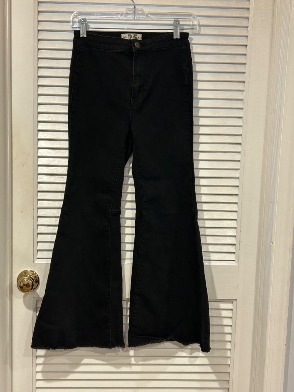 We The Free Extreme Flare High Rise Raw Hem Jeans Black